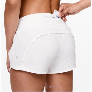 Lululemon shorts. White Run Times 4”.